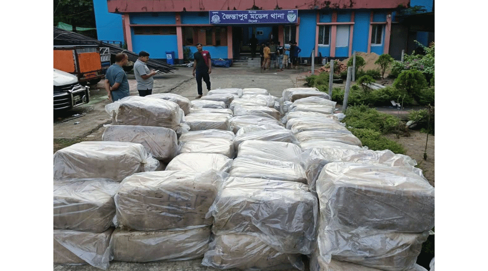সিলেটে বালুর নিচে কোটি টাকার শাড়ি